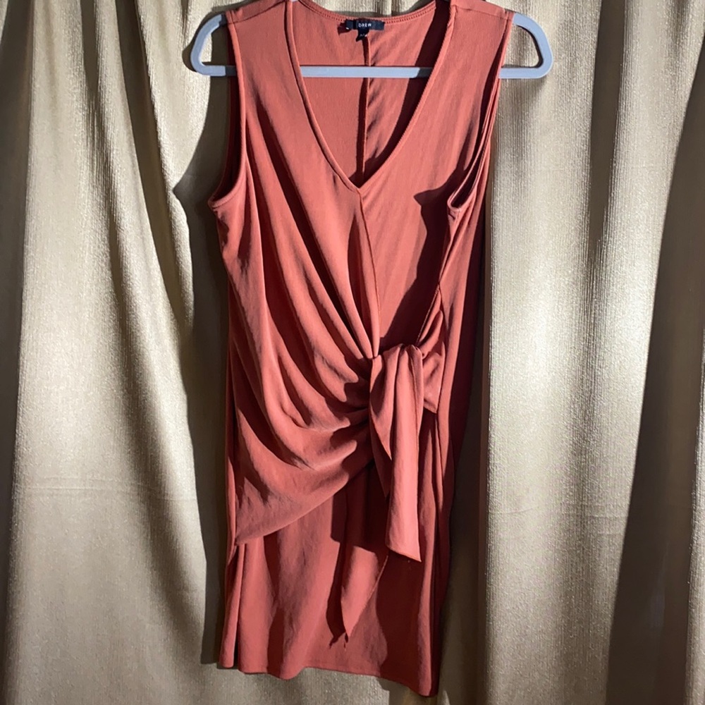 Rust colored dress ties to side